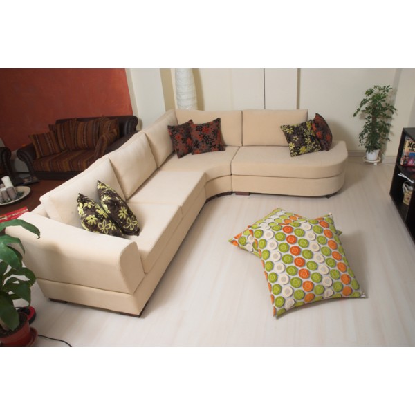 Ταπετσαριες Σαλονιων - Μοντέρνος γωνιακός καναπές Carabu με στρογγυλεμένη γωνία. Δυνατότητα επιλογής υφάσματος όπως και διαστάσεων.